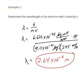 A particle has a de broglie wavelength of 2.7